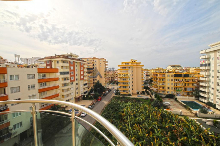 Меблированная трехкомнатная квартира в центре района Махмутлар, 100 м2 - Ракурс 13