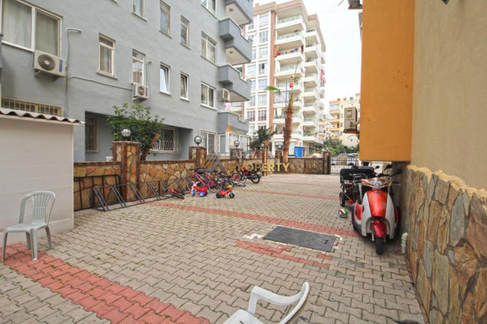 Меблированная трехкомнатная квартира в центре района Махмутлар, 100 м2 - Ракурс 18