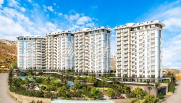 Квартира 1+1 с видом на море и горы в Махмутларе, 51 м² - Ракурс 1