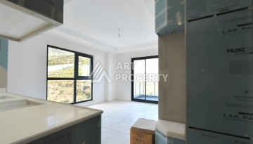 Квартира 1+1 с видом на море и горы в Махмутларе, 51 м² - Ракурс 2