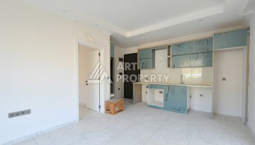 Квартира 1+1 с видом на море и горы в Махмутларе, 51 м² - Ракурс 4