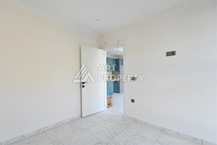 Квартира 1+1 с видом на море и горы в Махмутларе, 51 м² - Ракурс 7
