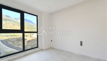 Квартира 1+1 с видом на море и горы в Махмутларе, 51 м² - Ракурс 9