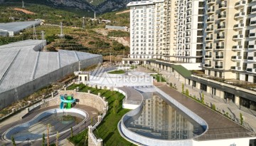 Квартира 1+1 с видом на море и горы в Махмутларе, 51 м² - Ракурс 15