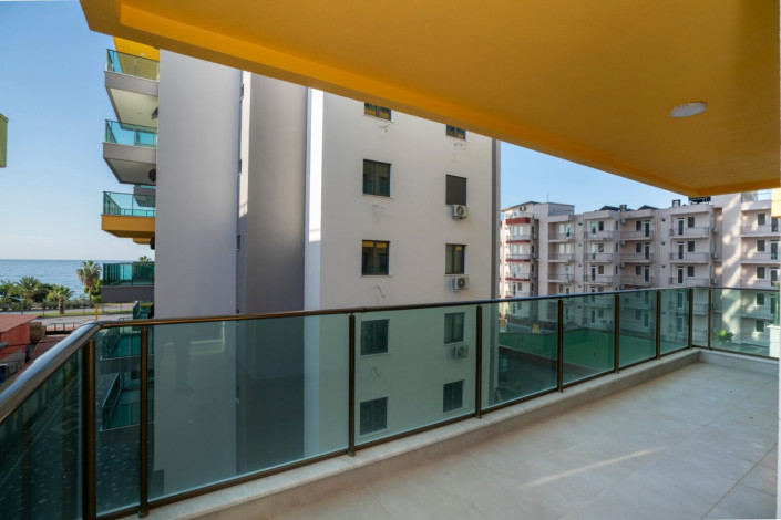 Уютная квартира 2+1 на первой береговой линии в районе Махмутлар, 90 м2 - Ракурс 10