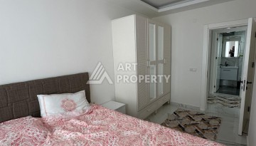 Двухкомнатная квартира с мебелью, 65 кв.м. в Махмутларе - Ракурс 14