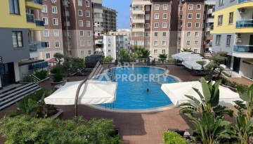 Двухкомнатная квартира с мебелью, 65 кв.м. в Махмутларе - Ракурс 24