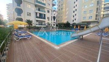 Квартира 2+1 в 350 м от моря в Махмутларе, 90 кв.м. - Ракурс 2