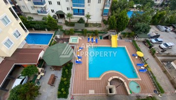 Квартира 2+1 в 350 м от моря в Махмутларе, 90 кв.м. - Ракурс 4