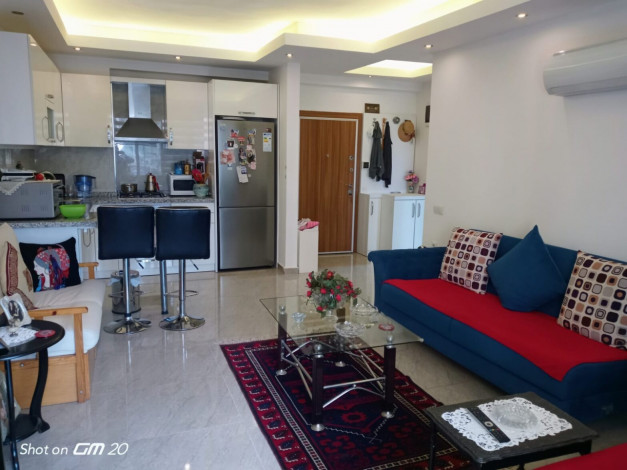 Квартира 1+1 в Махмутларе с отличной локацией, 65 м2 - Ракурс 6