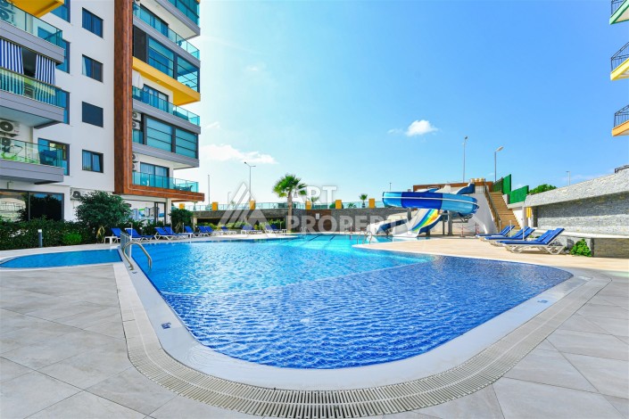 Квартира 2+1 в престижном ЖК, 90 кв.м. Махмутлар, Алания - Ракурс 0