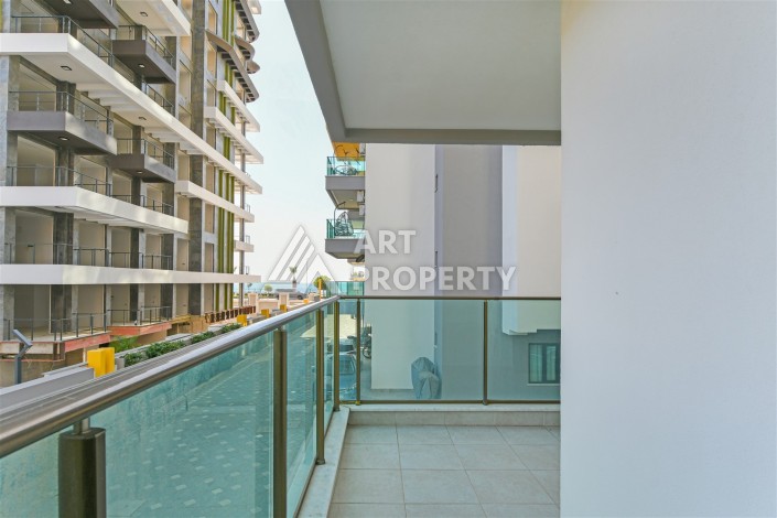 Квартира 2+1 в престижном ЖК, 90 кв.м. Махмутлар, Алания - Ракурс 5