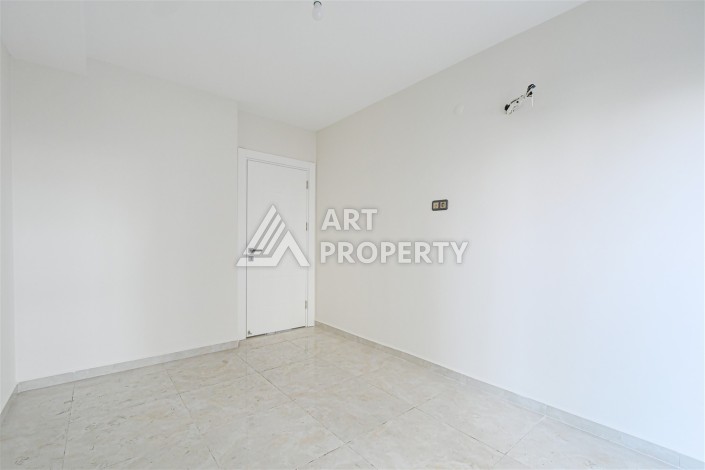 Квартира 2+1 в престижном ЖК, 90 кв.м. Махмутлар, Алания - Ракурс 10