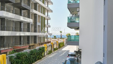 Квартира 2+1 в престижном ЖК, 90 кв.м. Махмутлар, Алания - Ракурс 14