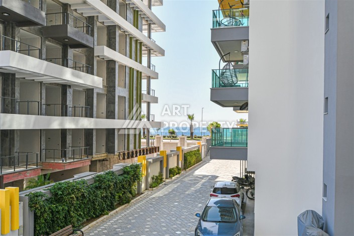 Квартира 2+1 в престижном ЖК, 90 кв.м. Махмутлар, Алания - Ракурс 13