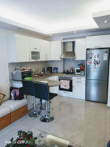 Квартира 1+1 в Махмутларе с отличной локацией, 65 м2 - Ракурс 13