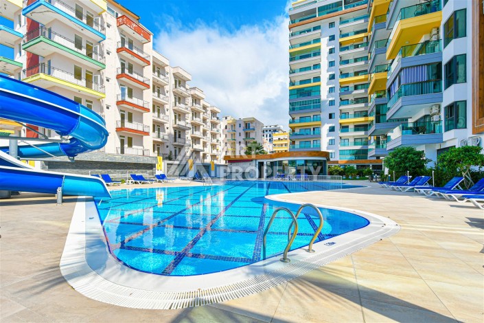 Квартира 2+1 в престижном ЖК, 90 кв.м. Махмутлар, Алания - Ракурс 30