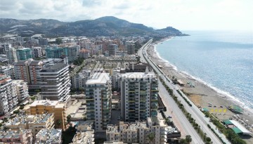 Квартира 2+1 в престижном ЖК, 90 кв.м. Махмутлар, Алания - Ракурс 35