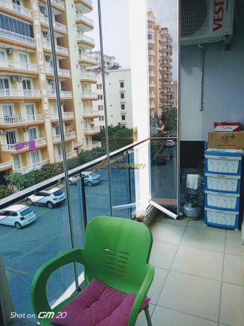 Квартира 1+1 в Махмутларе с отличной локацией, 65 м2 - Ракурс 15