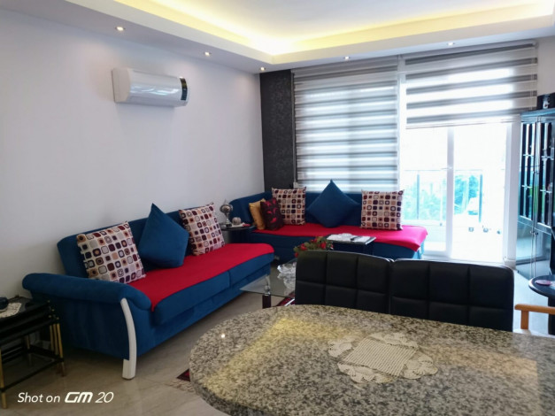 Квартира 1+1 в Махмутларе с отличной локацией, 65 м2 - Ракурс 16