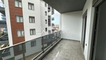 Новая квартира 1+1 в районе Тосмур, 55 кв.м. - Ракурс 3