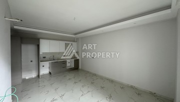Новая квартира 1+1 в районе Тосмур, 55 кв.м. - Ракурс 9