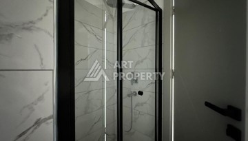 Новая квартира 1+1 в районе Тосмур, 55 кв.м. - Ракурс 12