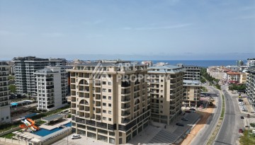 Квартира 1+1 в самом центре Махмутлара, 56 кв.м. - Ракурс 1