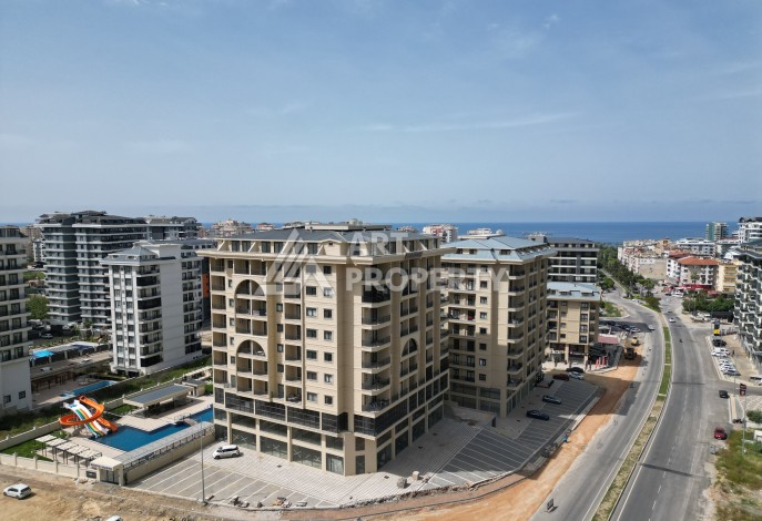 Квартира 1+1 в самом центре Махмутлара, 56 кв.м. - Ракурс 0