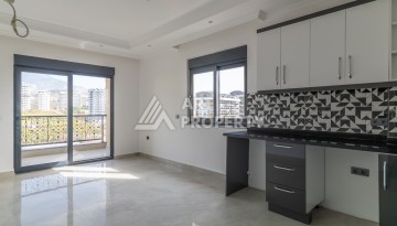 Квартира 1+1 в самом центре Махмутлара, 56 кв.м. - Ракурс 2