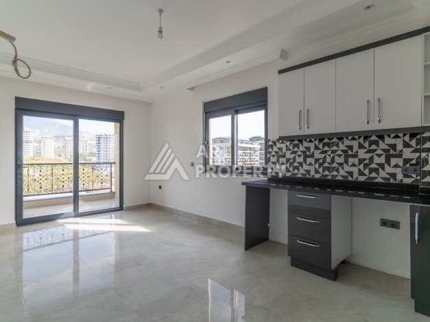 Квартира 1+1 в самом центре Махмутлара, 56 кв.м. - Ракурс 1