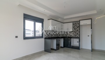 Квартира 1+1 в самом центре Махмутлара, 56 кв.м. - Ракурс 3