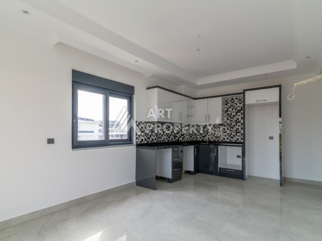 Квартира 1+1 в самом центре Махмутлара, 56 кв.м. - Ракурс 2