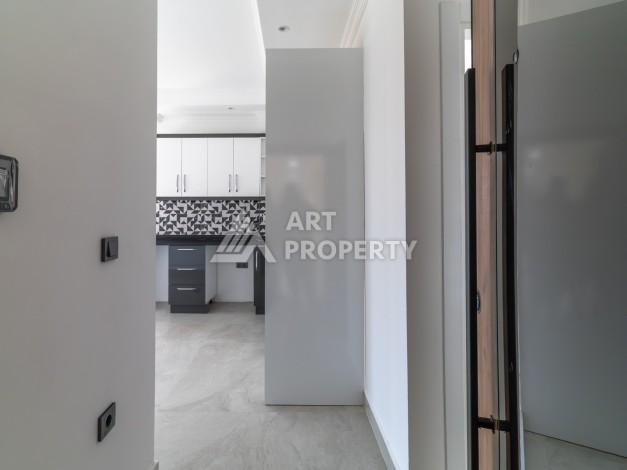 Квартира 1+1 в самом центре Махмутлара, 56 кв.м. - Ракурс 3