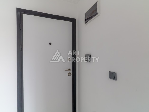 Квартира 1+1 в самом центре Махмутлара, 56 кв.м. - Ракурс 4