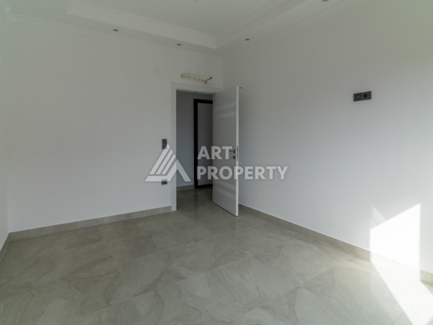 Квартира 1+1 в самом центре Махмутлара, 56 кв.м. - Ракурс 6