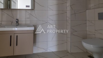 Квартира 1+1 в самом центре Махмутлара, 56 кв.м. - Ракурс 8