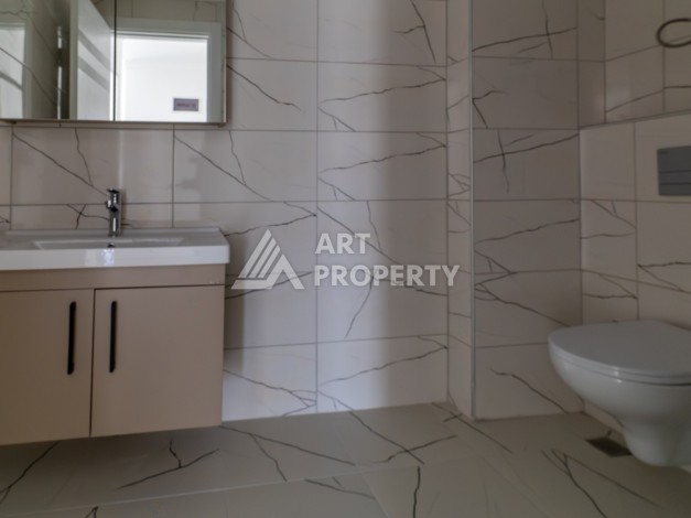 Квартира 1+1 в самом центре Махмутлара, 56 кв.м. - Ракурс 7
