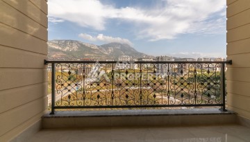 Квартира 1+1 в самом центре Махмутлара, 56 кв.м. - Ракурс 10