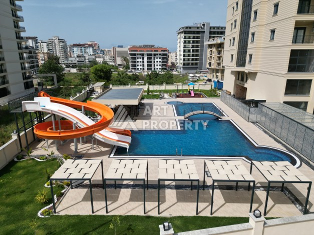 Квартира 1+1 в самом центре Махмутлара, 56 кв.м. - Ракурс 10