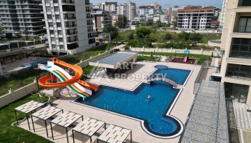 Квартира 1+1 в самом центре Махмутлара, 56 кв.м. - Ракурс 12