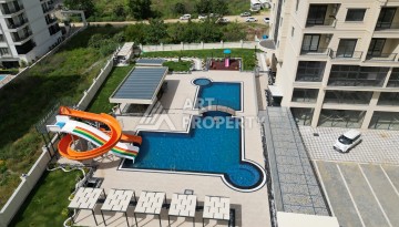 Квартира 1+1 в самом центре Махмутлара, 56 кв.м. - Ракурс 15