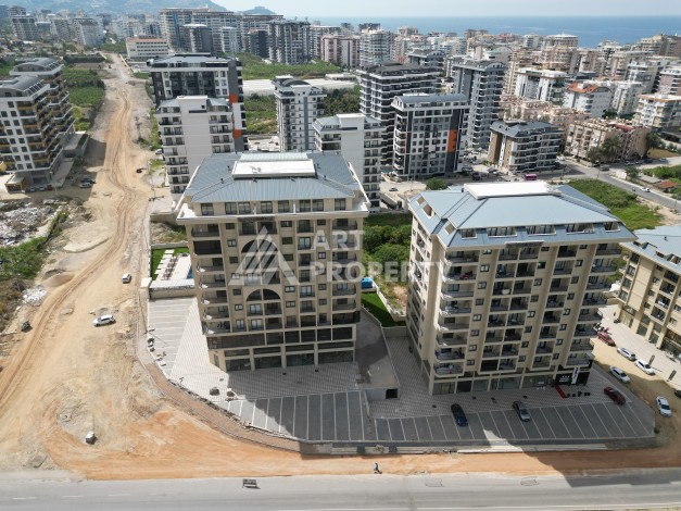 Квартира 1+1 в самом центре Махмутлара, 56 кв.м. - Ракурс 15