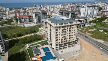 Квартира 1+1 в самом центре Махмутлара, 56 кв.м. - Ракурс 17