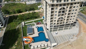 Квартира 1+1 в самом центре Махмутлара, 56 кв.м. - Ракурс 18