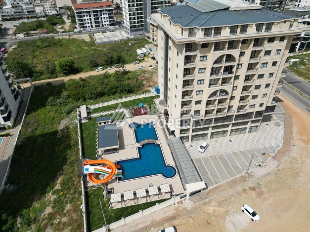 Квартира 1+1 в самом центре Махмутлара, 56 кв.м. - Ракурс 17