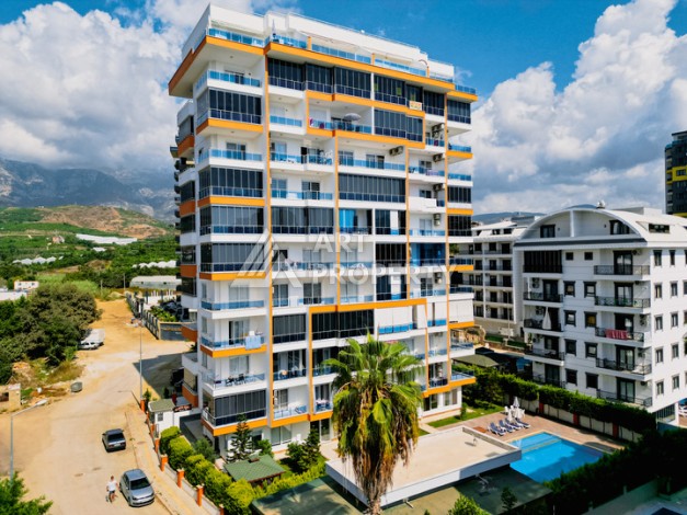 Просторная квартира 1+1 с застекленным балконом, 65 кв.м. - Ракурс 0