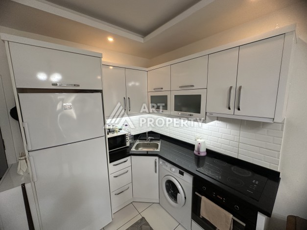 Просторная квартира 1+1 с застекленным балконом, 65 кв.м. - Ракурс 9