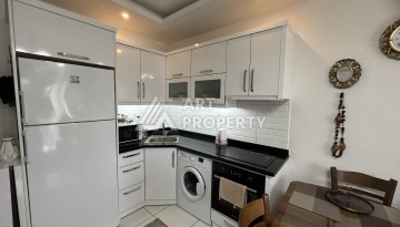 Просторная квартира 1+1 с застекленным балконом, 65 кв.м. - Ракурс 12