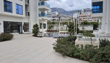Квартира 1+1 в элитной резиденции, 46 кв.м.  Махмутлар, Алания - Ракурс 37